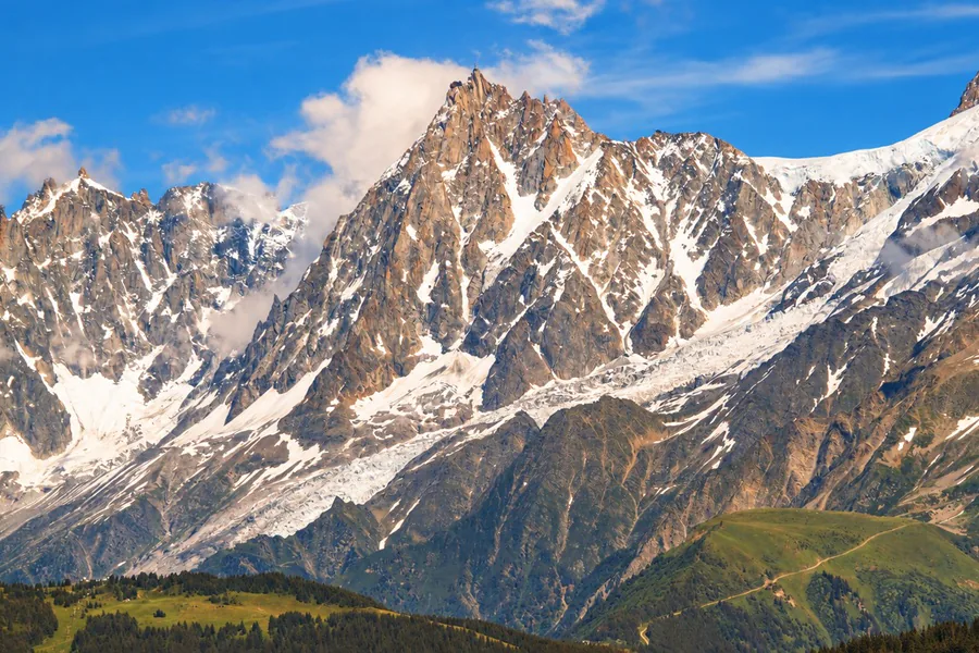 The needles and glaciers of the Mont Blanc massif, above the alpine pastures