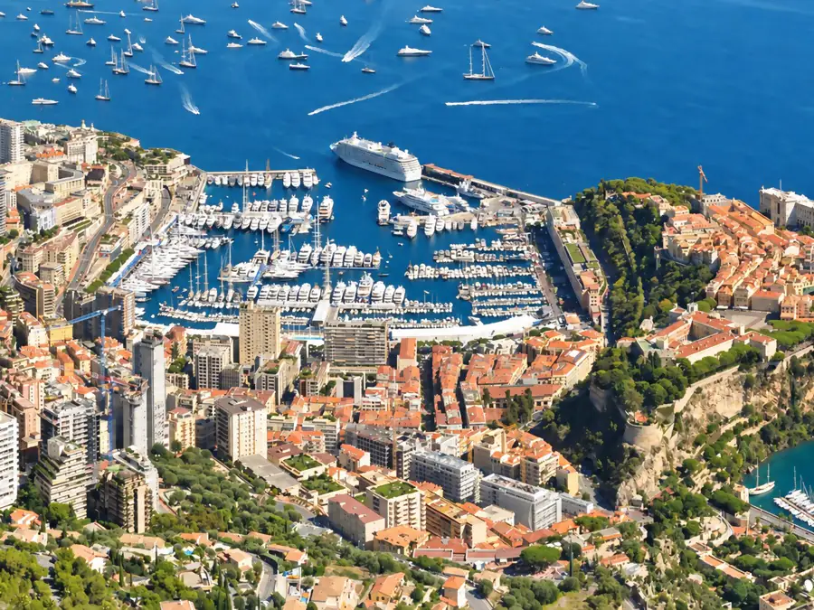 Monaco seen from the heights, Port Hercules full of yachts between the Rock and Monte Carlo